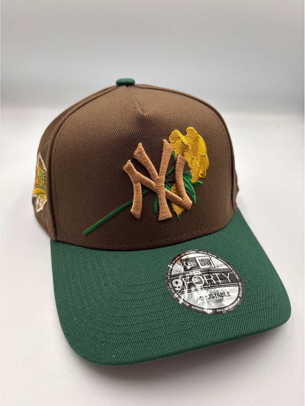 New Era 9FORTY Adjustable Brown and Green NY Baseball Cap with Yellow Flower